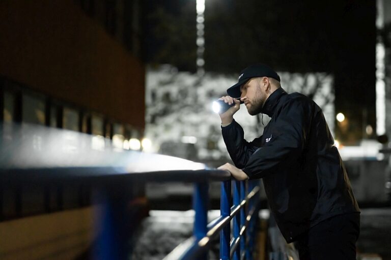 Construction site Security Guard Walking Building